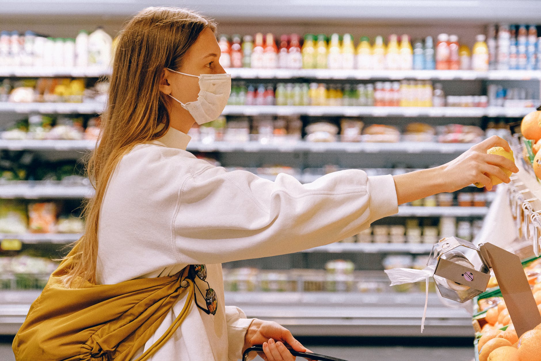 woman wearing mask in supermarket